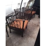 Set of three industrial metal arm chairs in the oriental style.