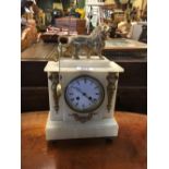 Victorian onyx and brass mantle clock.