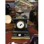 Victorian marble and brass mantle clock.