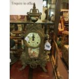 Brass and enamel mantle clock.