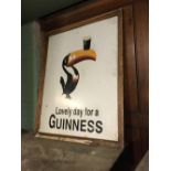 Unusual framed "Lovely day for a Guinness" toucan advertisement sign.