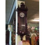 Mahogany spring driven Vienna clock.