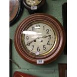 1920's mahogany circular wall clock.