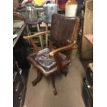 1920's oak office swivel chair.