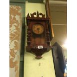 Victorian mahogany wall clock.