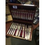 Cased Walker and Hall twenty four piece silver plate cutlery set.