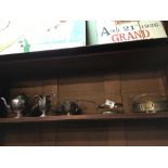 Shelf of misc. silver plate.