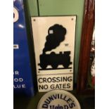 Cast iron railway sign CROSSING NO GATES.