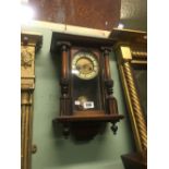 Victorian mahogany wall clock stamped G HICKS of Northampton.