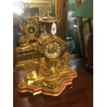 C19th. French gilded mantle clock on stand.