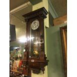 Victorian mahogany double weighted Vienna wall clock.