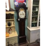 C19th. mahogany long case clock with painted arch dial.