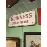 1960's GUINNESS SOLD HERE advertising sign.