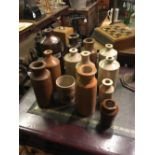 Collection of C19th. stoneware bottles.