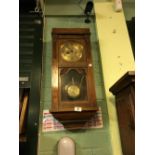 1930's brass dial mahogany wall clock.