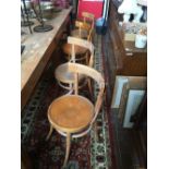 Set of eight bentwood chairs.