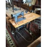 Singer table base electric sewing machine.