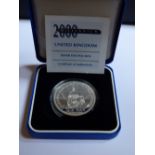 BRITISH ROYAL MINT 2000  MILLENNIUM SILVER £5 COIN IN ORIGINAL CASE AND CERTIFICATE OF AUTHENTICITY