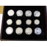 PRESENTATION BOXED COINS INCLUDING 1998 TUVALU $5 COIN, FOUR SOLOMON ISLAND COINS,