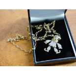 9CT YELLOW GOLD ARTICULATED RAGDOLL PENDANT ON 9CT CHAIN 7.