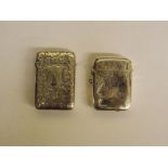 TWO HM BIRMINGHAM SILVER VESTA CASES WITH ENGRAVED DECORATION AND ENGRAVED CARTOUCHE 1.
