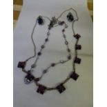 UNMARKED WHITE METAL NECKLACE WITH AMETHYST GLASS DROPPERS,