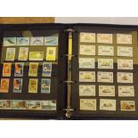 ALBUM OF WORLD POSTAGE STAMPS INC VIRGIN ISLANDS,JAMAICA,NEW ZEALAND ,