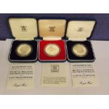 TWO BOXED HM SILVER PROOF HRH PRINCE OF WALES AND LADY DIANA SPENCER COMMEMORATIVE COIN AND A