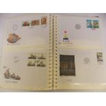 A BINDER OF ALAND FINLAND FIRST DAY COVERS INCLUDING OWLS, FOSSILS,