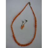 UNMARKED WHITE METAL MOUNTED CORAL NECKLACE AND EARRING SET