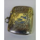 HM BIRMINGHAM SILVER VESTA CASE WITH ENGRAVED FOLIATE DECORATION