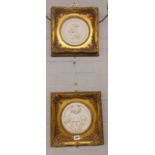 PAIR OF BAS RELIEF CHERUB PLAQUES IN SWEPT GILT WOOD FRAMES