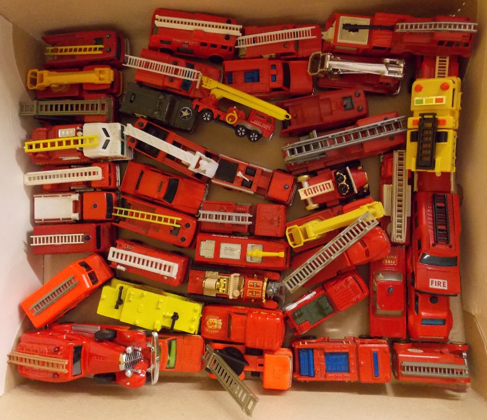 TRAY OF UNBOXED SLIGHTLY WORN FIRE ENGINES AND TRUCKS BY VARIOUS MAKERS