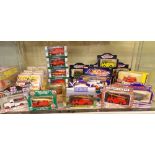 SHELF OF MINT AND BOXED MISCELLANEOUS FIRE ENGINES AND TRUCKS BY VANGUARD, CARARAMA,