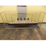 SCALE MODEL OF RMS TITANIC IN GLAZED CASE 171 X 80 X 34CM