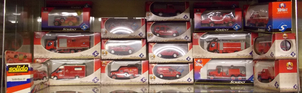 SHELF OF SOLIDO DIECAST MODELS OF FIRE ENGINES,