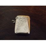 BIRMINGHAM SILVER VESTA CASE WITH ENGRAVED DECORATION AND A MONOGRAM 4CM