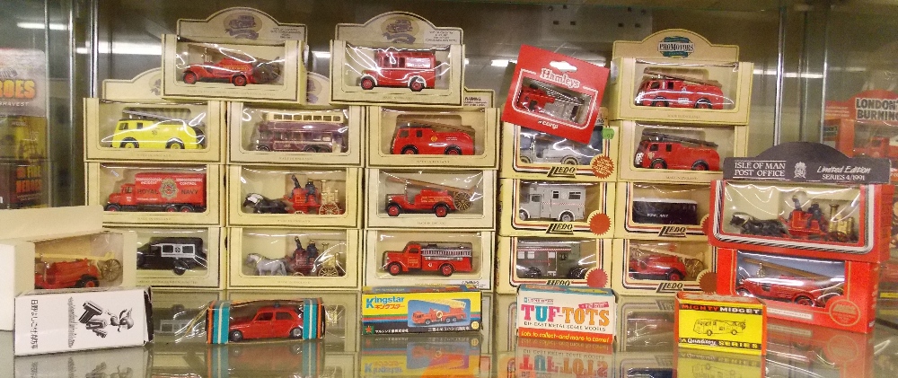 SHELF OF MINT AND BOXED LLEDO AND MODELS OF DAYS GONE BY FIRE ENGINES