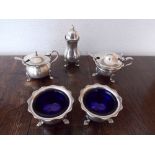 BIRMINGHAM SILVER FIVE PIECE CRUET SET RAISED ON PAW FEET