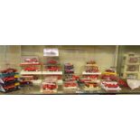 SHELF OF SOLIDO PERSPEX BOXED FIRE ENGINES AND MAJORETTE 1/43 SCALE MODELS