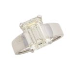 18K WHITE GOLD RING set with an emerald cut diamond (5.02ct.), size 7 1/2, 8.5 grams