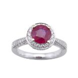 18K WHITE GOLD FILIGREE RING set with a full cut ruby (1.68ct.) encircled by 110 small brilliant cut