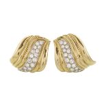 PAIR OF EUROPEAN JEWELLERY 18K YELLOW AND WHITE GOLD CLIP-BACK EARRINGS each set with 16 brilliant