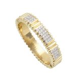 14K YELLOW AND WHITE GOLD HINGED BANGLE set with 42 brilliant cut diamonds (approx. 1.68ct.t.w.),
