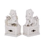 A PAIR OF BLANC DE CHINE DEHUA BUDDHIST FU-LIONS, 19TH CENTURY 清19世紀 德化佛獅一對 Each very finely modeled