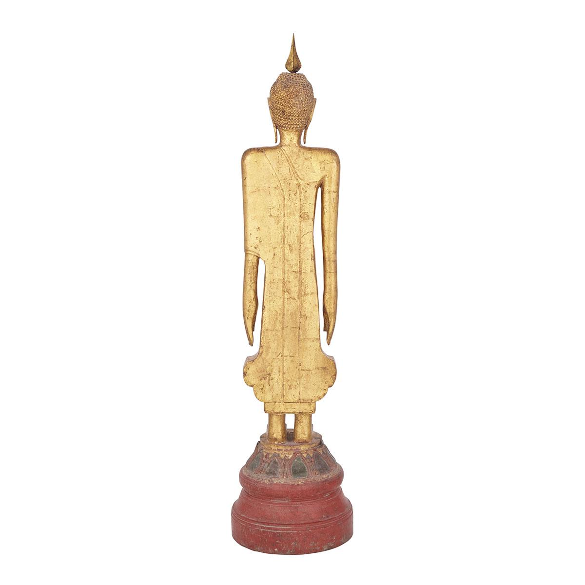 THAI WOODEN AYUTTHAYA STYLE BUDDHA, 19TH CENTURY 泰國 19世紀 大城時代風格 木製漆金立姿佛 Atop a lotus petal base, - Image 2 of 2