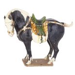 TANG-STYLE HORSE, 20TH CENTURY OR EARLIER 唐陶馬 Naturalistically modeled with a muscular body,