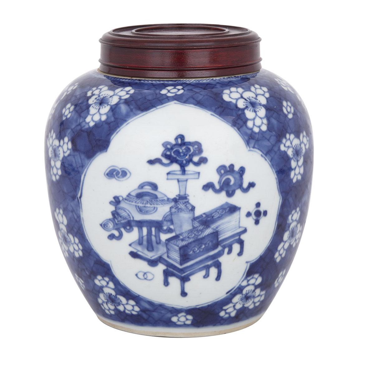 A BLUE AND WHITE ‘100 ANTIQUES’ GINGER JAR AND COVER, MARK OF KANGXI AND OF THE PERIOD (1662-1722)