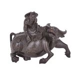 A CARVED SILVER INLAID WOOD BULL AND BOY, REPUBLIC PERIOD 民國 木雕嵌銀絲 童子牧牛擺件 Finely and dynamically