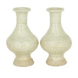 PAIR OF YINGQING VASES, SONG DYNASTY (960-1279) 宋 影青瓶一對 With four registers of raised floral